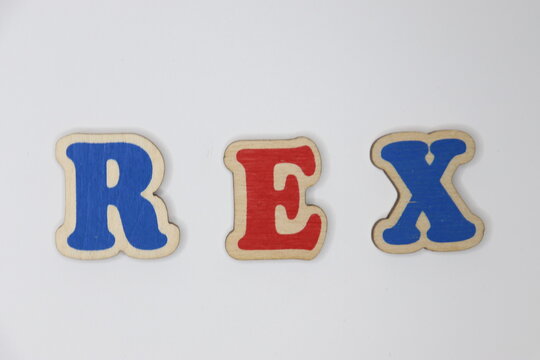 Text "" from colored wooden letters on a white background.