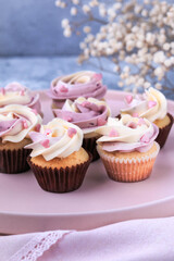 Mini cupcakes with Buttercream Icing. Easter cupcakes decorated with candy sprinkles.