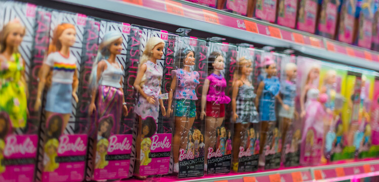 Barbie dolls put up for sale on a store shelf