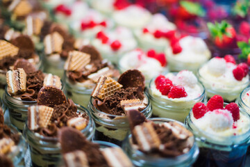 Assorted bio desserts presented in a cafe refrigerator