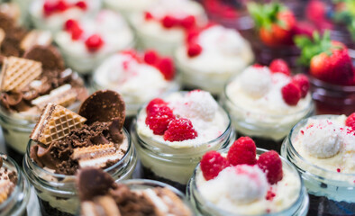 Assorted bio desserts presented in a cafe refrigerator