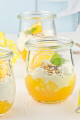 Dessert of cottage cheese with orange turmeric caramel sauce