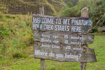 Wooden tourist information sign at Pinatubo volcano.