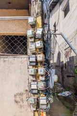 Various electricity meters on a pole on Boaracay island, Philippines
