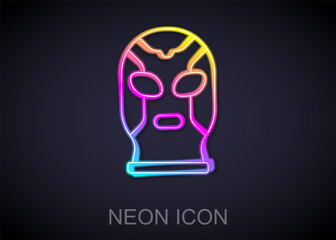 Glowing neon line Mexican wrestler icon isolated on black background. Vector