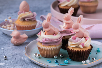 Mini Easter cupcakes decorated with Easter Bunny. 