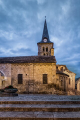 Fototapeta na wymiar Bosost church tower in the blue hour, Valle de Aran, Lleida Spain, vertical