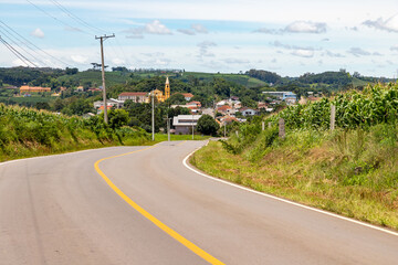 Fototapeta na wymiar Road, village and plantation