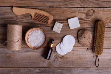 Eco friendly washing  bathroom accessories on wooden rustic background, top view.  Eco friendly, zero waste concept.