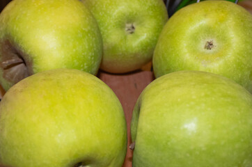 Green apples background, close up