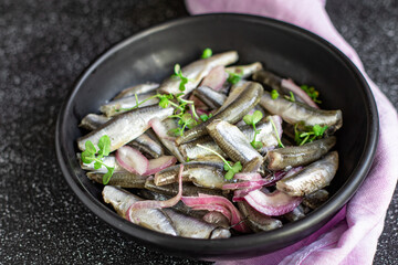 anchovy fish seafood marinated salad appetizer small herring healthy vegetarian pescetarian meal top view copy space food background rustic image