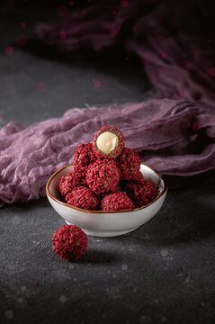 Tasty sweet truffles on dark background
