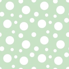 Colorful seamless dot pattern with pastel green background 