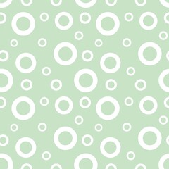 Colorful seamless pattern texture with white circles and pastel green background