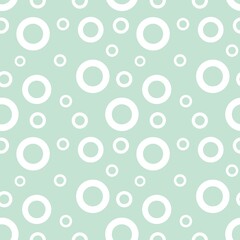 Colorful seamless pattern texture with white circles and pastel green background
