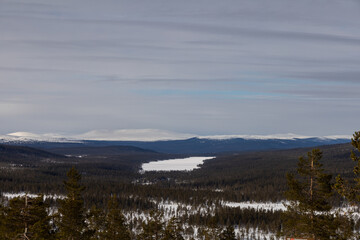 Winter landscape with Scandinavian mountains and a frozen lake.Shot at Idre fjäll in Sweden, Scandinavia.
