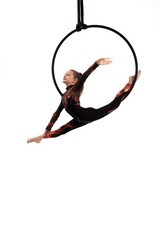 Aerial acrobat performing trick on hula hoop © Wisky