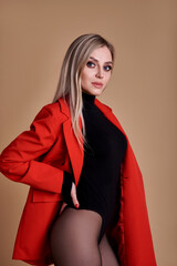 Slender and young girl with a beautiful and toned body. Woman in bodysuit and boots. Sport, diet,...