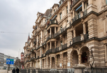 Beautiful house with balconies, columns and sculptures at General-Guisan-Quai