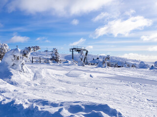 Blue sky, snow and a ski lift in Lapland, Finland