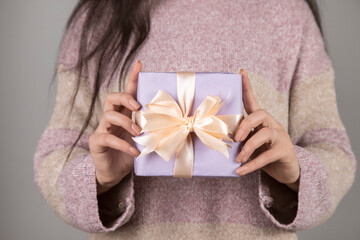 woman holding gift box