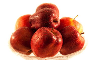 Red apples in a glass bowl