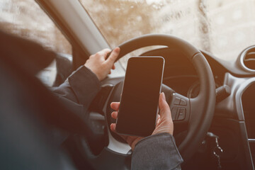 Looking at mobile phone screen while driving