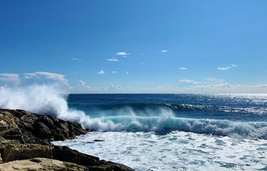 waves crashing on rocks