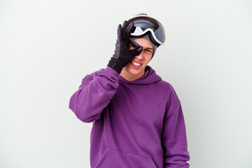 Young man holding a snowboard board isolated on white background excited keeping ok gesture on eye.