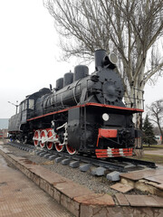 Obraz premium Steam locomotive on the square