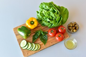 Healthy vegetables and chicken for preparing homemade meals with the Mediterranean diet. Fresh food background, photo concept, flat lay, copy space, whole foods