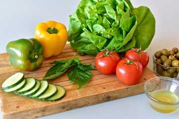 Healthy vegetables and chicken for preparing homemade meals with the Mediterranean diet. Fresh food background, photo concept, flat lay, copy space, whole foods