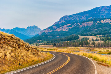Curved paved road in Yellowstone National Park