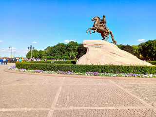 The Bronze Horseman - the famous equestrian statue of Peter the Great on Senate Square in St. Petersburg - landmark, view on a clear sunny day