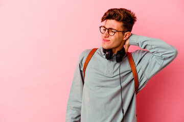 Young student man isolated on pink background touching back of head, thinking and making a choice.