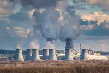 Nuclear power plant with Cooling tower of Atomic power station with nuclear reactor. Industrial...