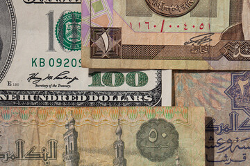 100 US dollar  and  old one riyal of Saudi Arabia, 50 piastres of Egypt