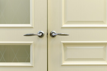 Milky white door with handle and glass.