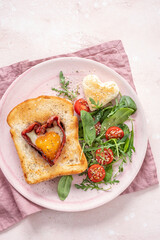 Egg in a hole of bread heart shape