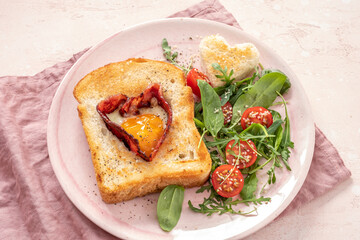 Egg in a hole of bread heart shape