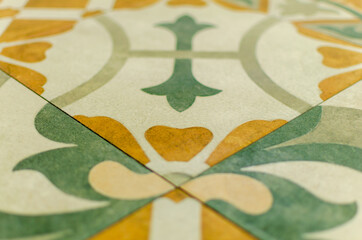 Laying decorative tiles with patterns in a country house.