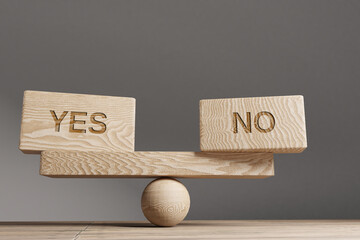 Yes no balance concept. Wooden cube block with word Yes no on seesaw. Life style concept