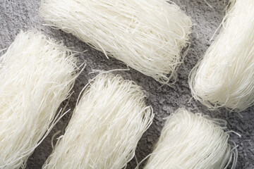 Cellophane noodles close-up. White long bean noodles in briquettes. An ingredient for making Asian soups and other dishes