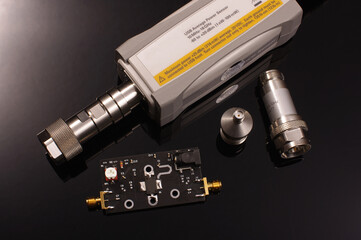 RF power sensor and microwave PCB isolated on black
