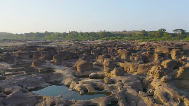 Aerial view of Sam Phan Bok, Ubon Ratchathani, Thailand. Dry rock reef in the Mekong River. Nature landscape background. Grand Canyon of Thailand.