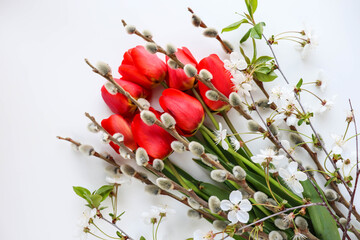 Easter greeting card. Easter eggs, flowers and willow twigs  © Palanga