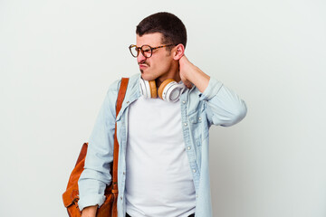 Young caucasian student man listening to music isolated on white background suffering neck pain due to sedentary lifestyle.