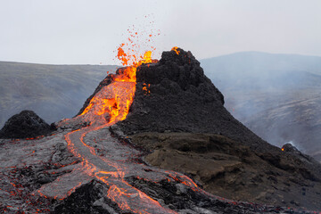GELDINGADALIR, ICELAND - MARCH 21, 2021: A small volcanic eruption started at the Reykjanes...