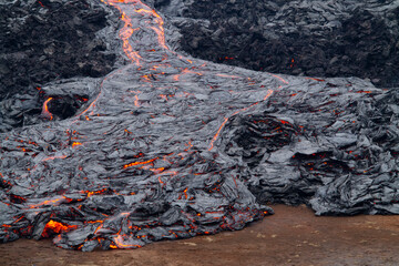 GELDINGADALIR, ICELAND - MARCH 21, 2021: A small volcanic eruption started at the Reykjanes...