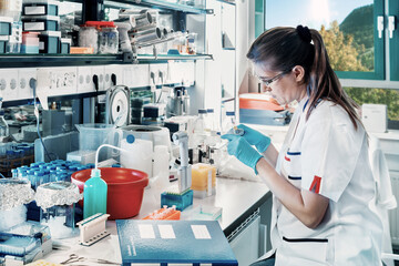 Young scientist works in modern laboratory